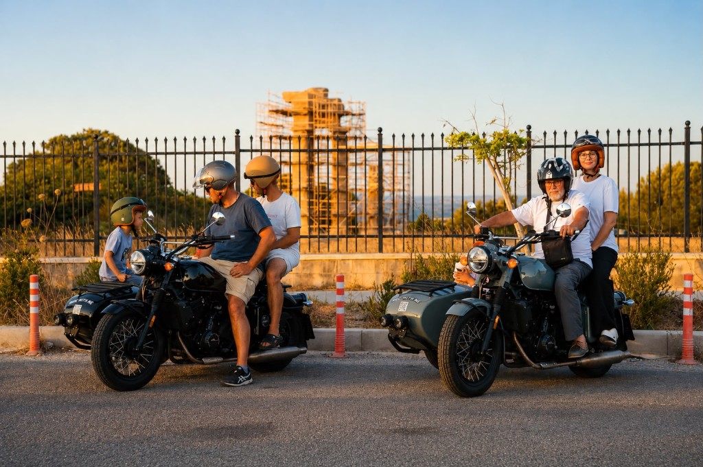 Two vintage sidecars parked near the Temple of Apollo at sunset