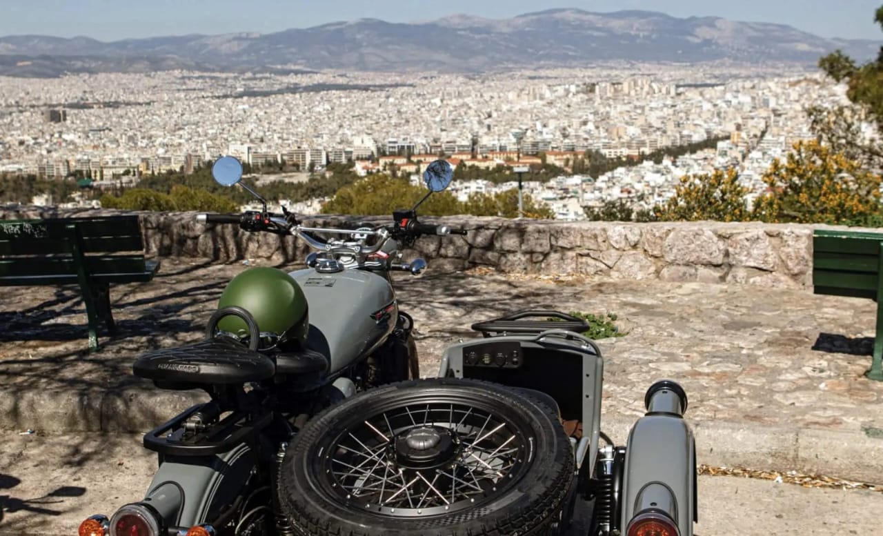 Vintage sidecar parked with a sweeping panoramic view